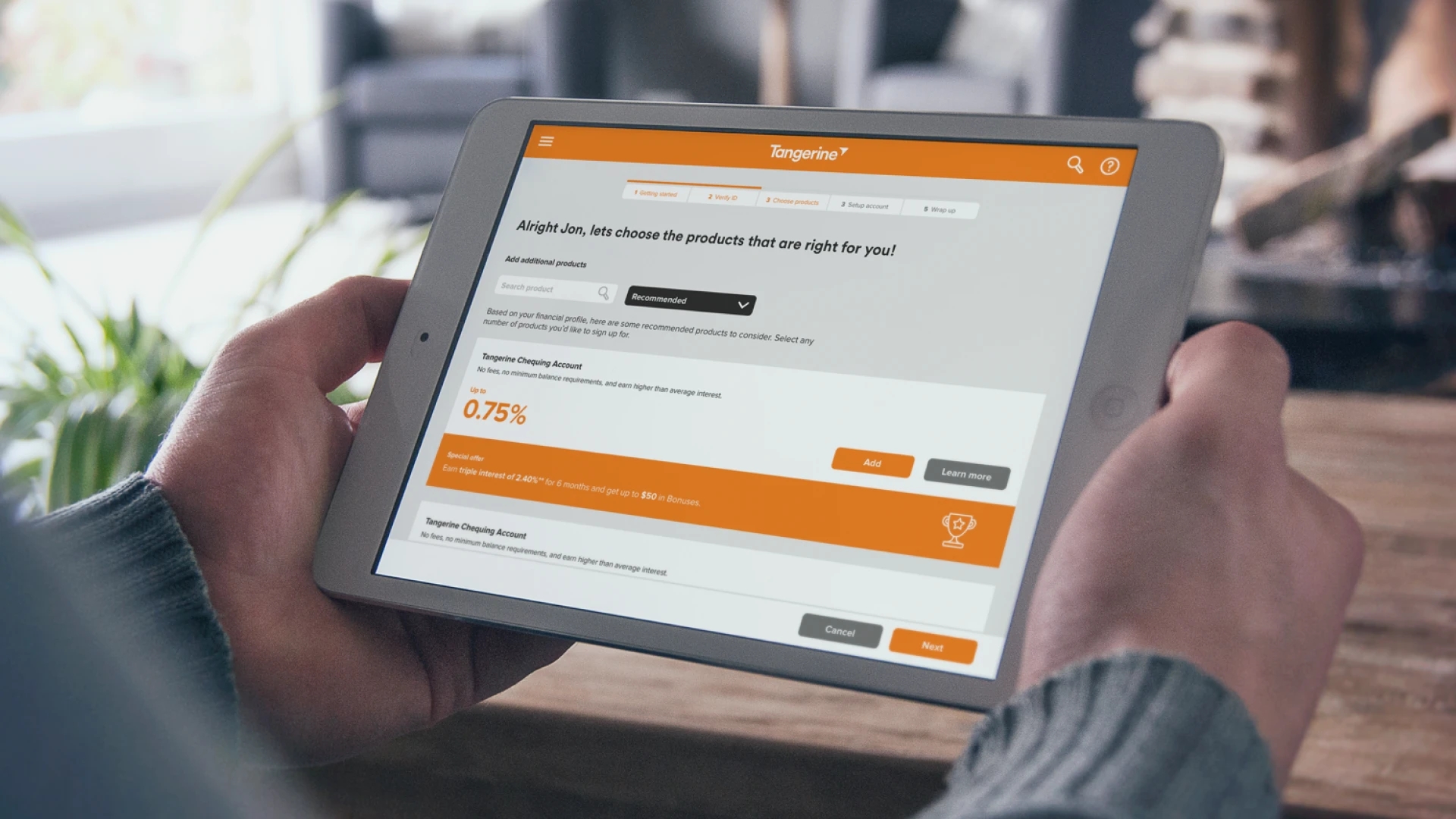 composite image of a user holding an ipad running the tangerine sign-up app in a tangerine cafe